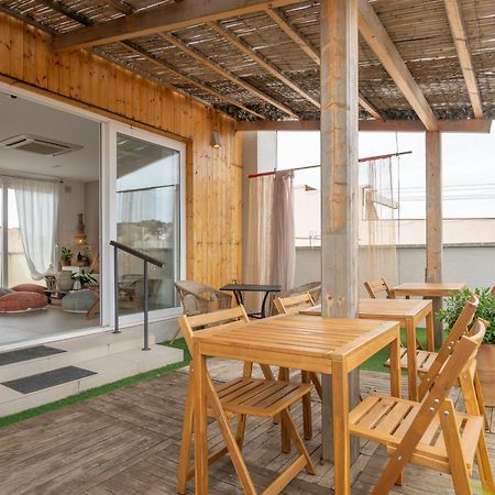Hostal Boutique Es Portalet ซานต์เฟลิอูเดกีโซลส์ ภายนอก รูปภาพ